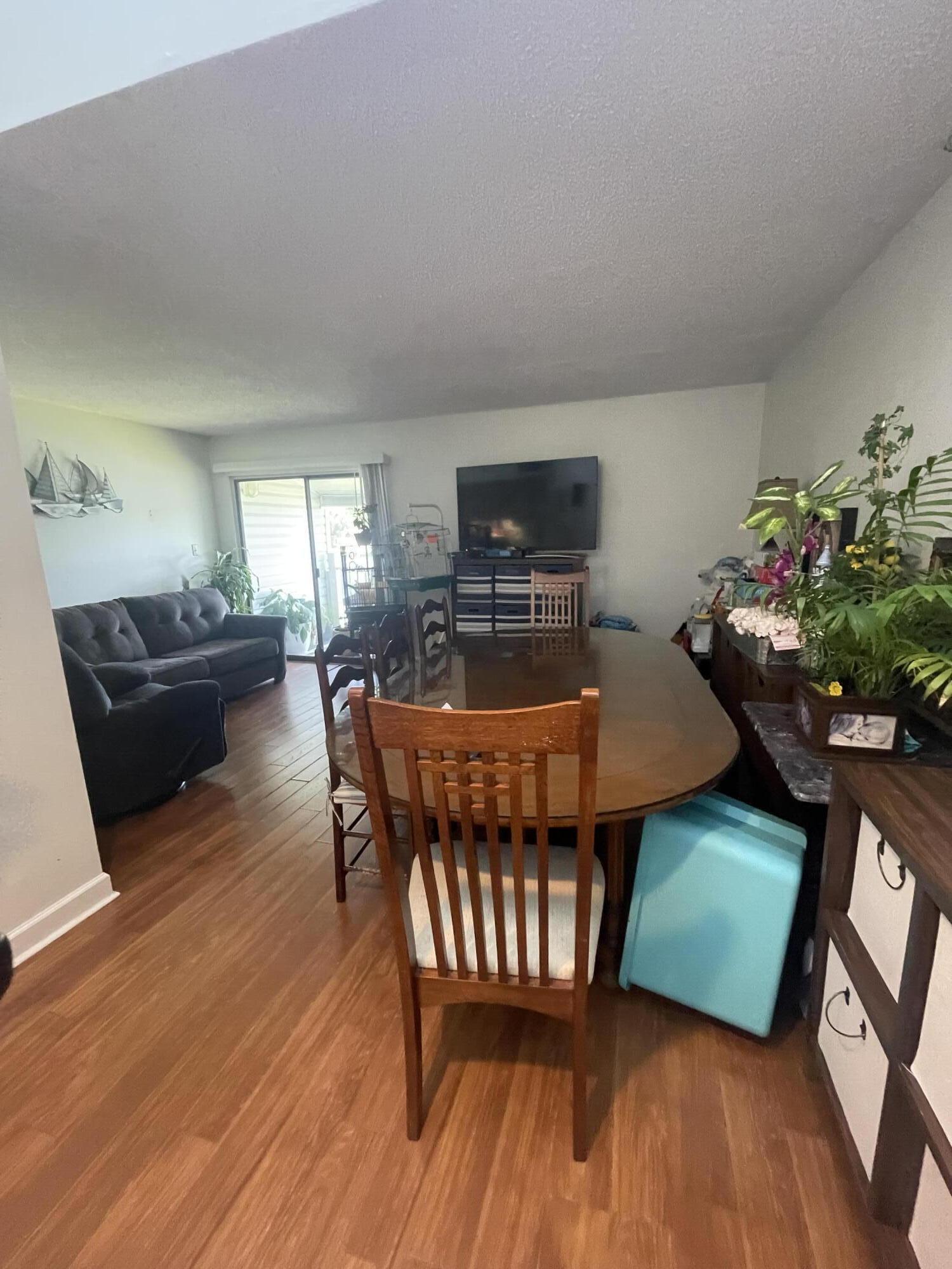 101 Old Ferry Road, Unit 29C Shalimar, FL 32579 - Photo 11 of 30 a living room with furniture and a wooden floor