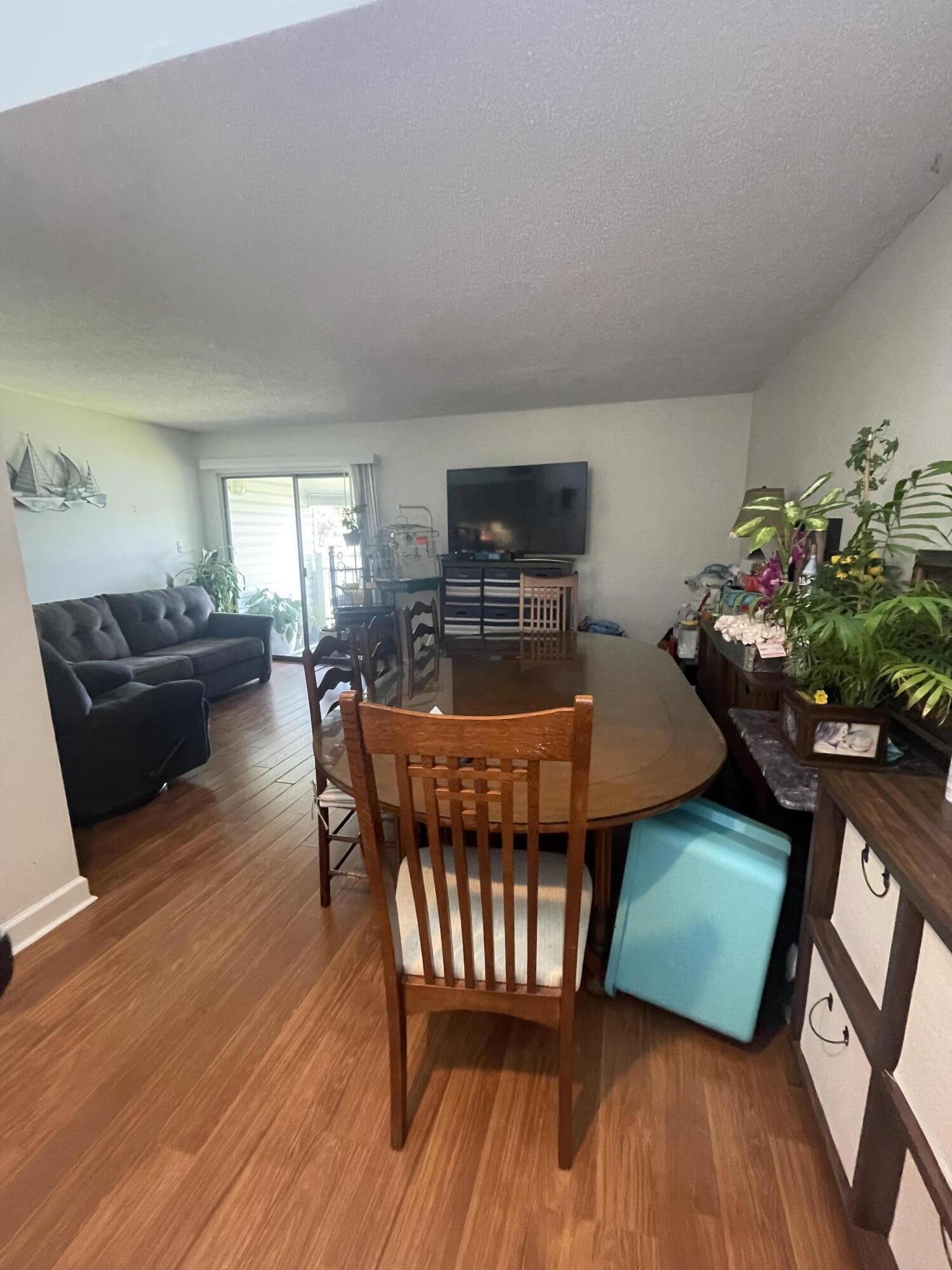 101 Old Ferry Road, Unit 29C Shalimar, FL 32579 - Photo 14 of 30 a living room with furniture and a wooden floor