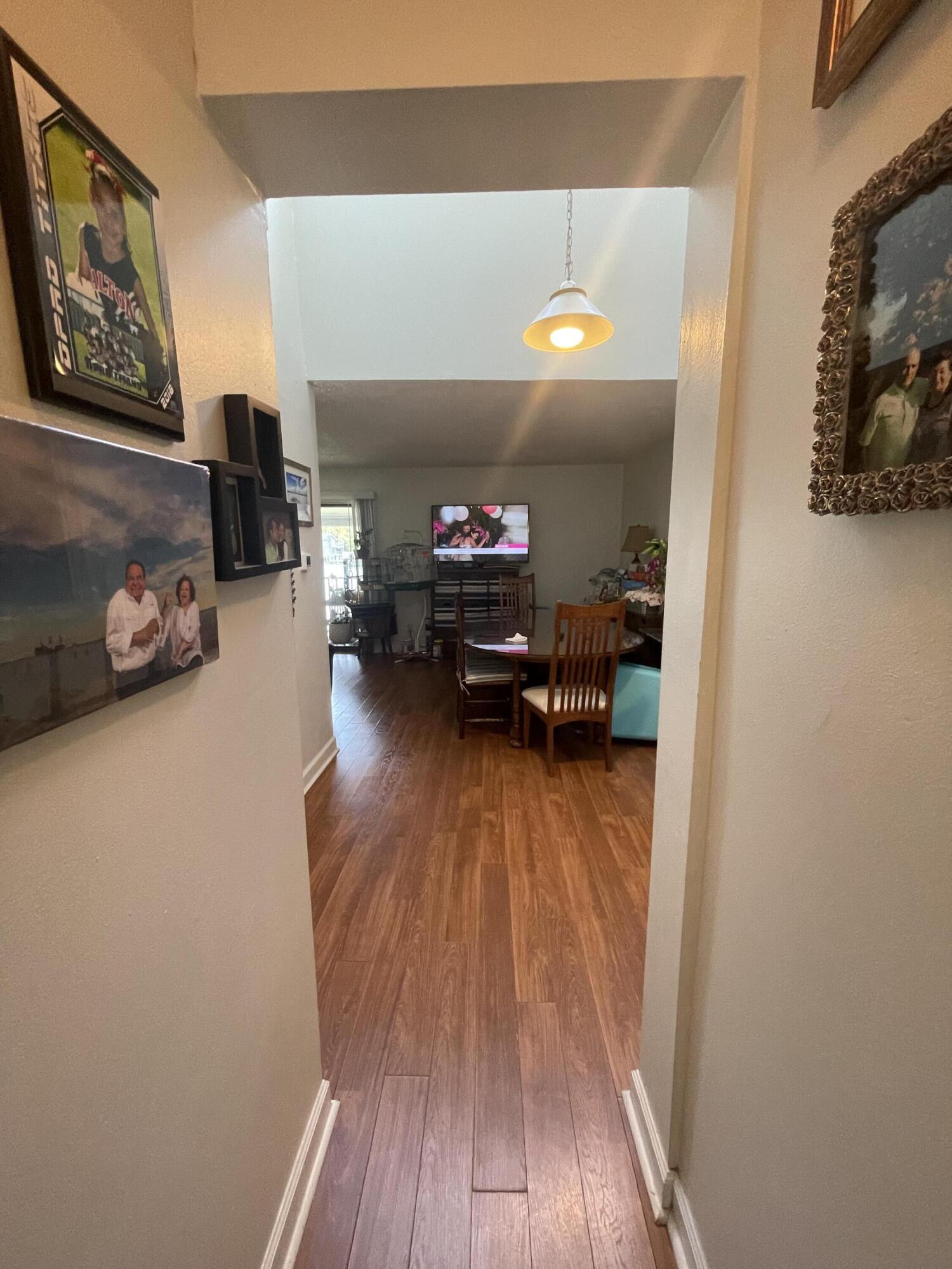 101 Old Ferry Road, Unit 29C Shalimar, FL 32579 - Photo 15 of 30 a living room with furniture and a wooden floor