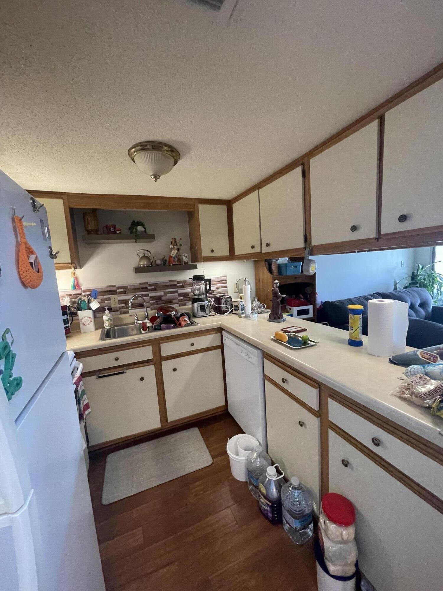 101 Old Ferry Road, Unit 29C Shalimar, FL 32579 - Photo 16 of 30 a kitchen with a sink and cabinets