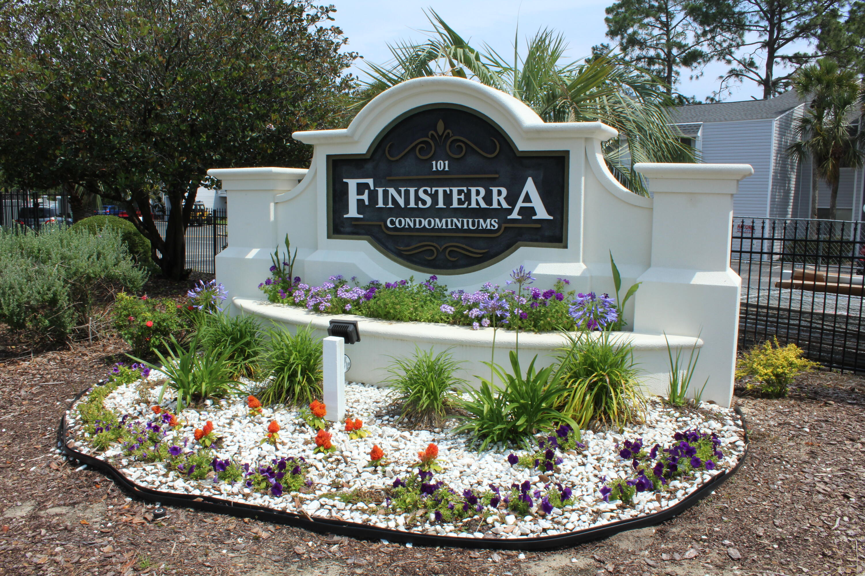 101 Old Ferry Road, Unit 29C Shalimar, FL 32579 - Photo 20 of 30 a view of a wooden bench in a fruit room