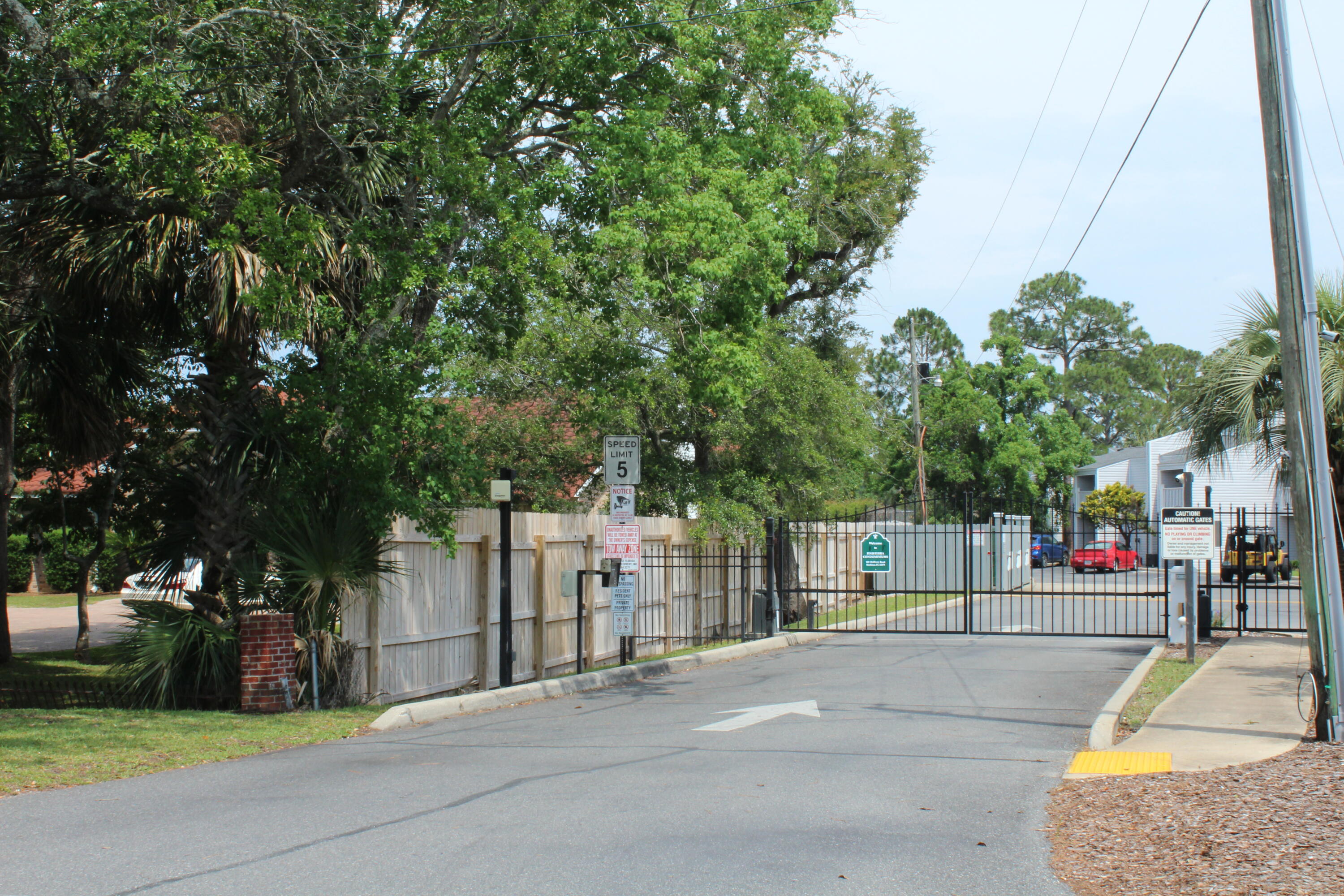 101 Old Ferry Road, Unit 29C Shalimar, FL 32579 - Photo 21 of 30 a building with trees in front of it