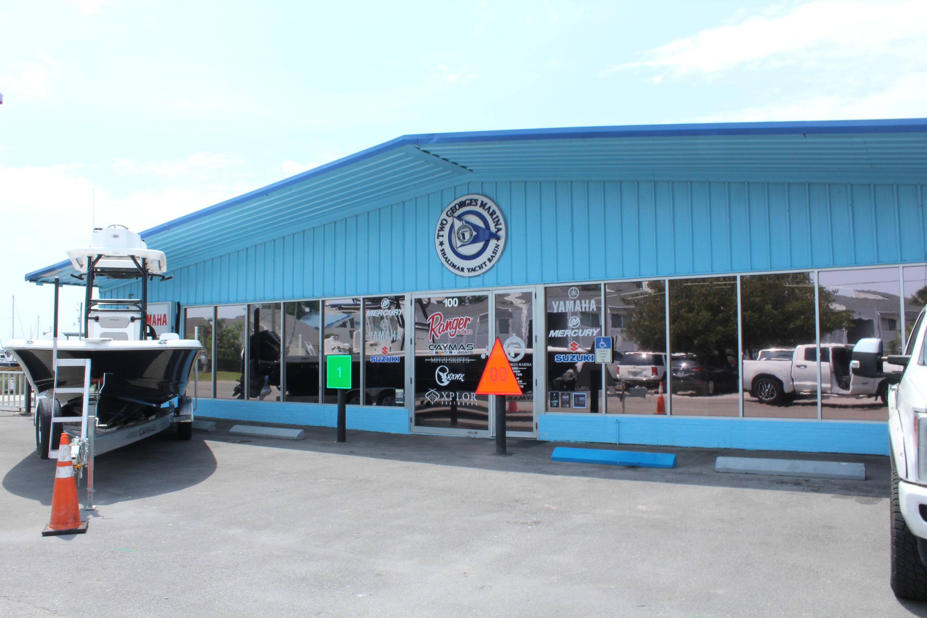 101 Old Ferry Road, Unit 29C Shalimar, FL 32579 - Photo 22 of 30 a view of a patio with table and chairs with wooden fence