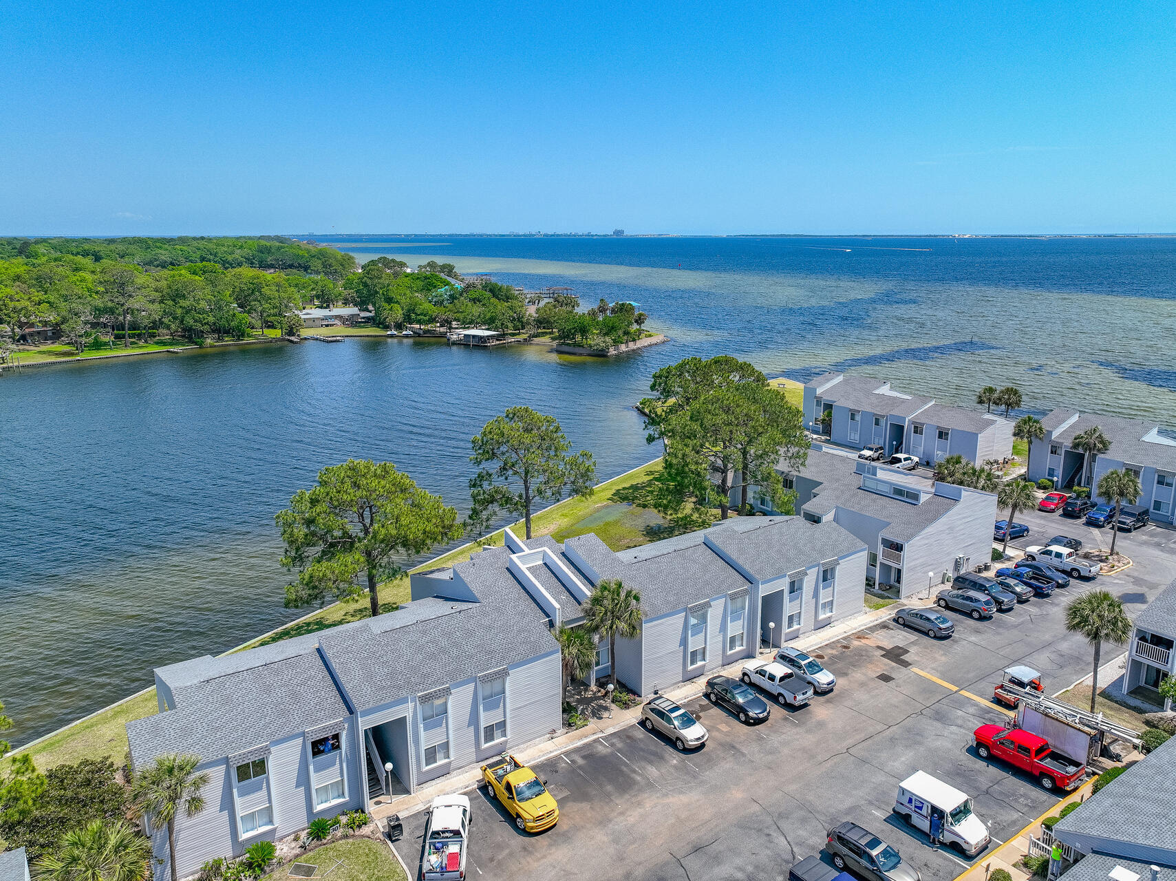 101 Old Ferry Road, Unit 29C Shalimar, FL 32579 - Photo 25 of 30 an aerial view of residential houses with outdoor space and ocean view
