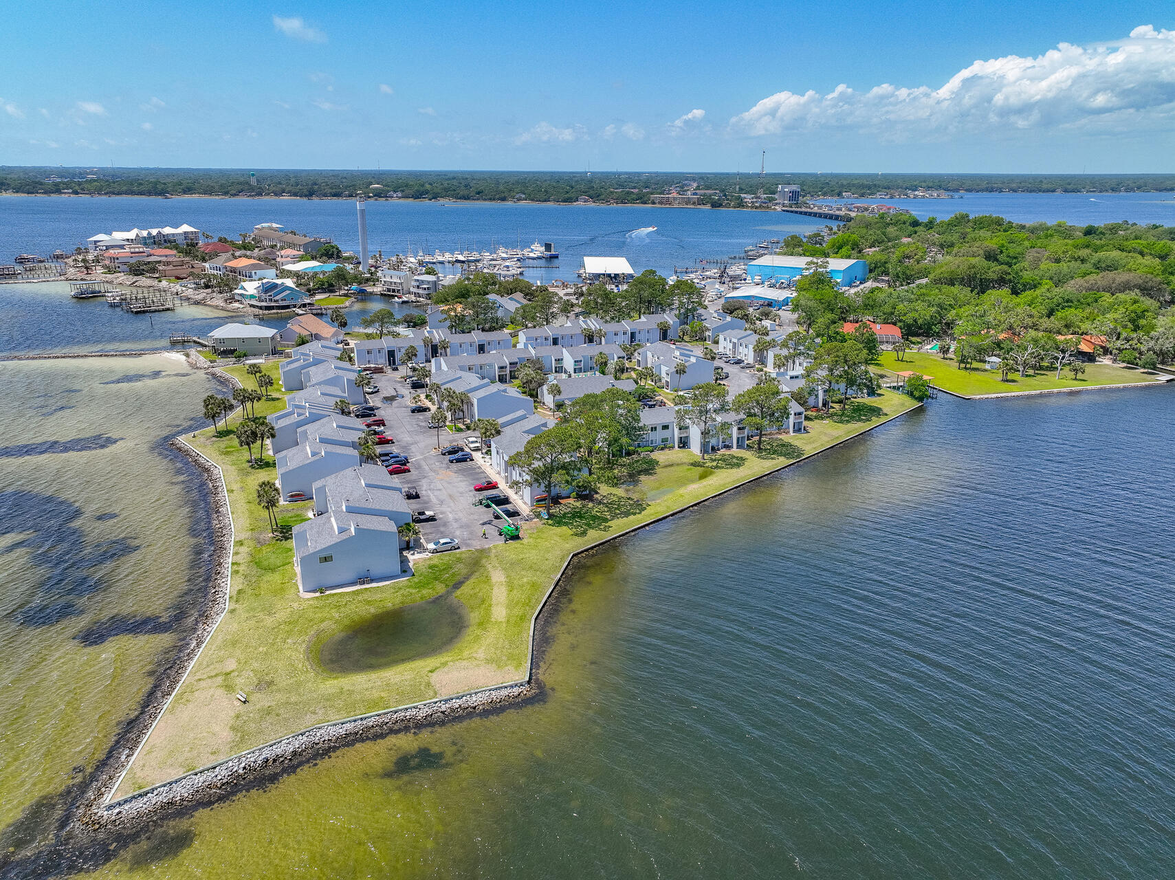 101 Old Ferry Road, Unit 29C Shalimar, FL 32579 - Photo 3 of 30 an aerial view of a house with a swimming pool outdoor seating and yard