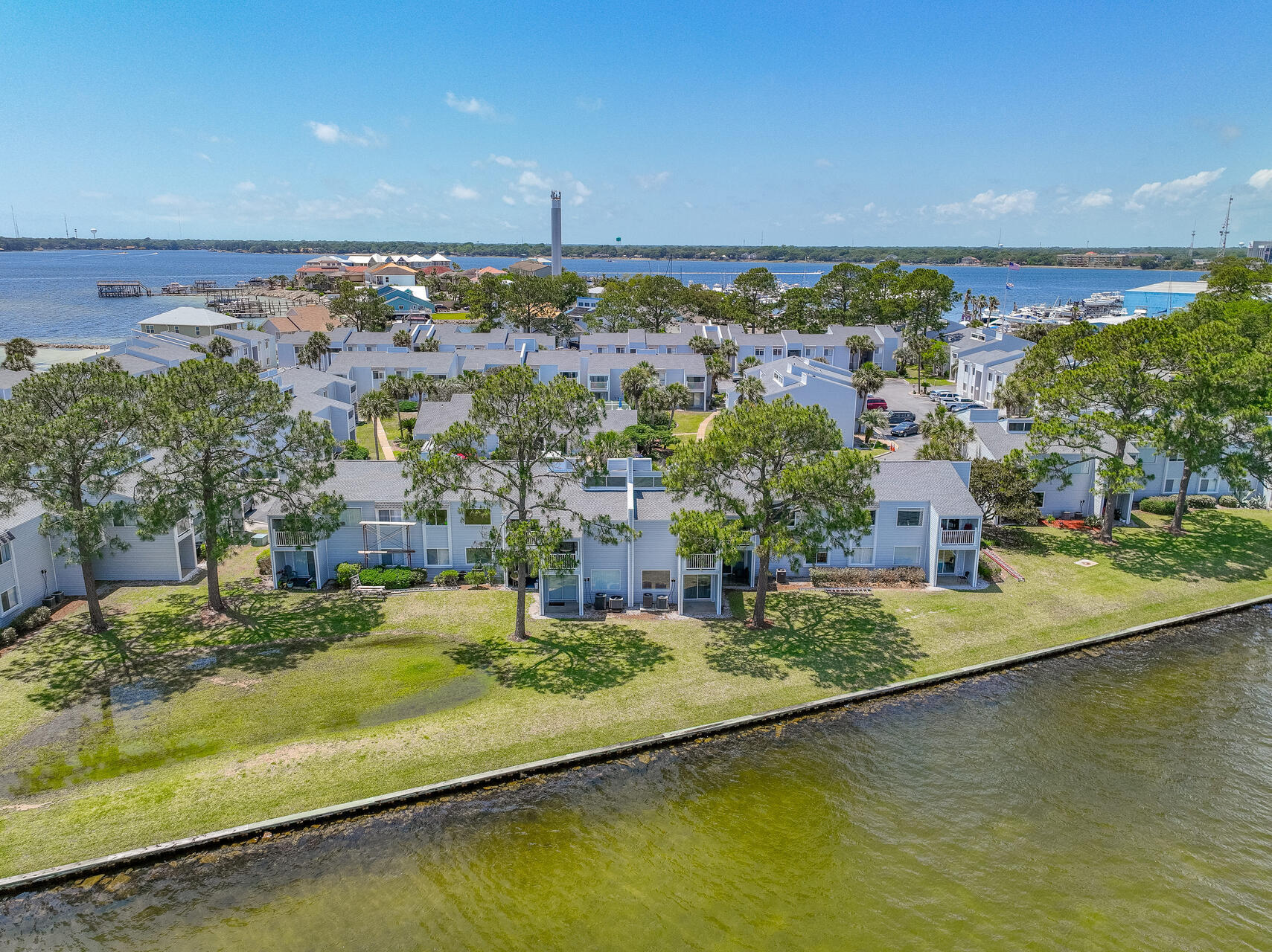 101 Old Ferry Road, Unit 29C Shalimar, FL 32579 - Photo 4 of 30 a view of a lake with a building in the background