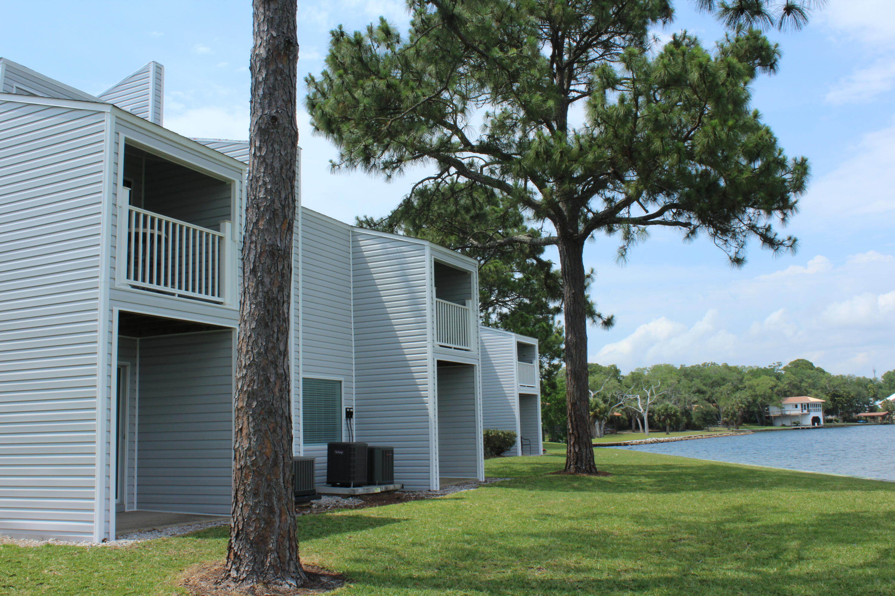 101 Old Ferry Road, Unit 29C Shalimar, FL 32579 - Photo 8 of 30 a view of a house with a yard