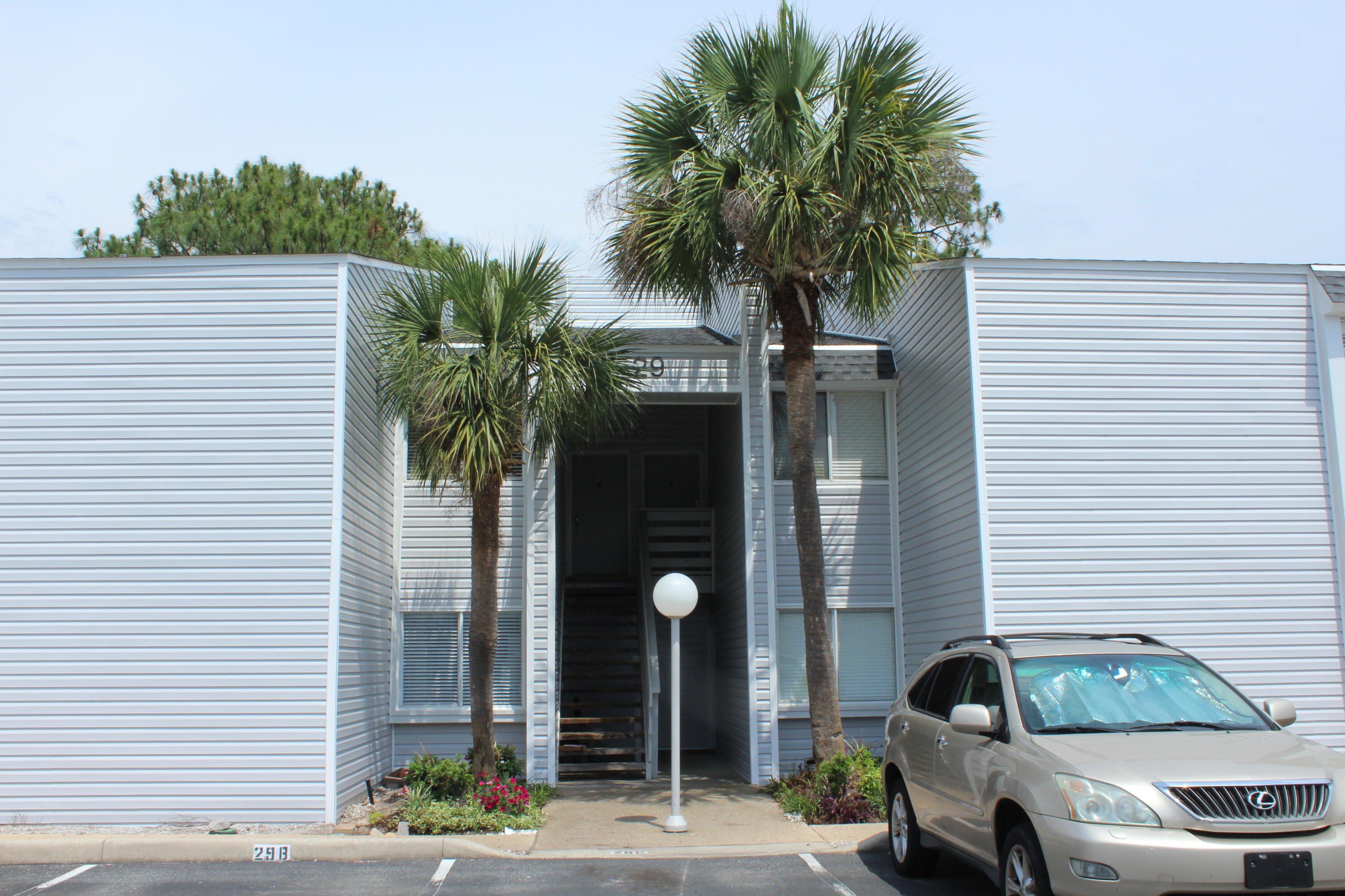 101 Old Ferry Road, Unit 29C Shalimar, FL 32579 - Photo 9 of 30 a car parked in front of a house