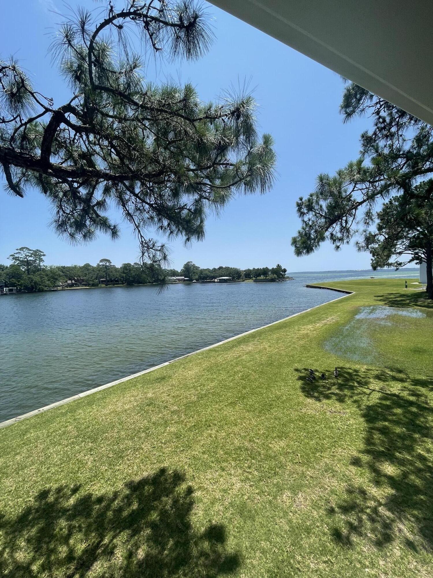 101 Old Ferry Road, Unit 29C Shalimar, FL 32579 - Photo 10 of 30 a view of a lake with a beach