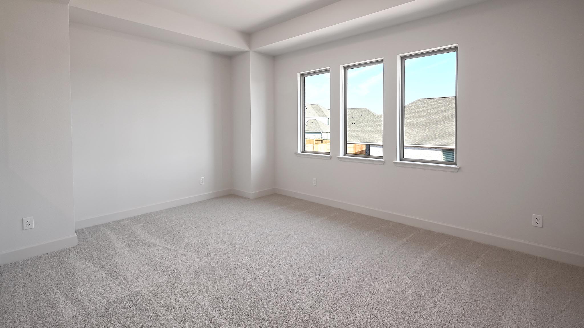523 Prickly Poppy Loop Kyle, TX 78640 - Photo 23 of 40 Spare room with light colored carpet and baseboards