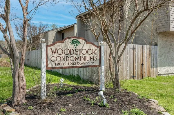 a sign on the side of the road