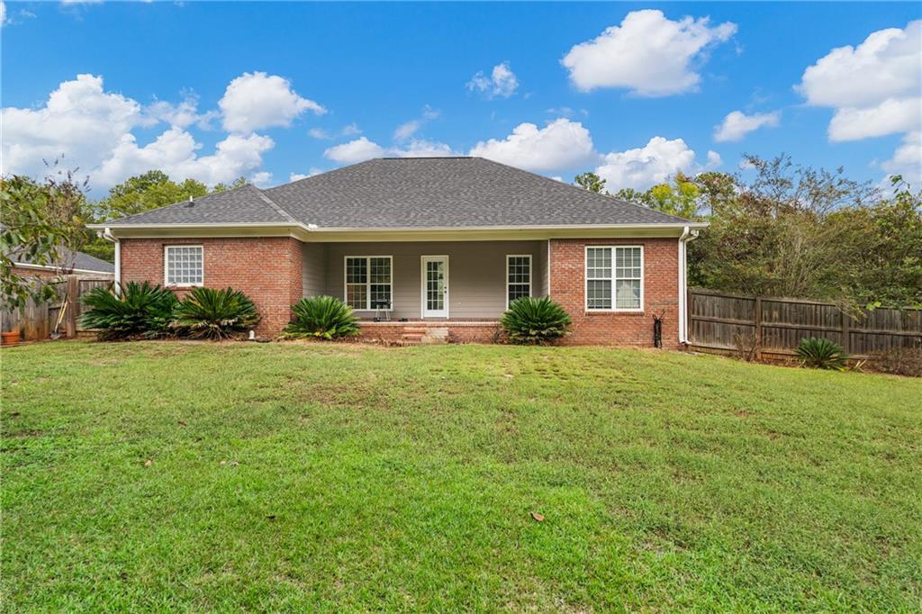 1449 Cummings Road Smiths Station, AL 36877 - Photo 25 of 28 Brick exterior with a covered patio and a shingle roof