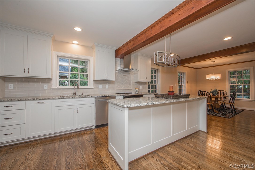 2729 West Brigstock Road Midlothian, VA 23113 - Photo 12 of 50 a kitchen with stainless steel appliances granite countertop a stove and a sink