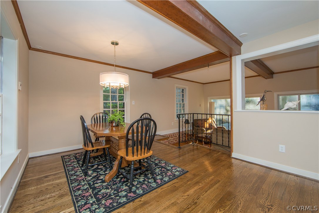 2729 West Brigstock Road Midlothian, VA 23113 - Photo 15 of 50 a dining room with furniture and a rug