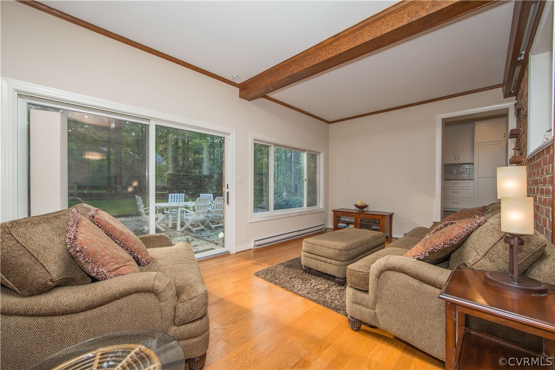 2729 West Brigstock Road Midlothian, VA 23113 - Photo 20 of 50 a living room with furniture and large windows