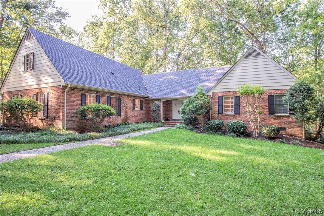 2729 West Brigstock Road Midlothian, VA 23113 - Photo 2 of 50 a view of a house with a yard potted plants and a large tree