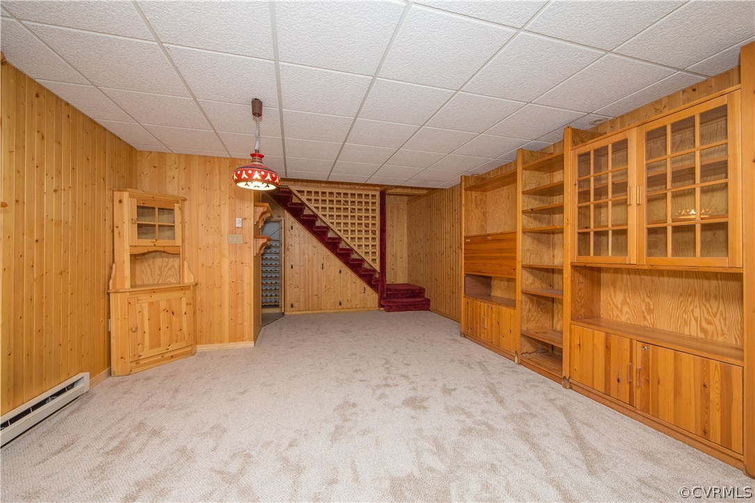 2729 West Brigstock Road Midlothian, VA 23113 - Photo 25 of 50 a view of an empty room with wooden floor