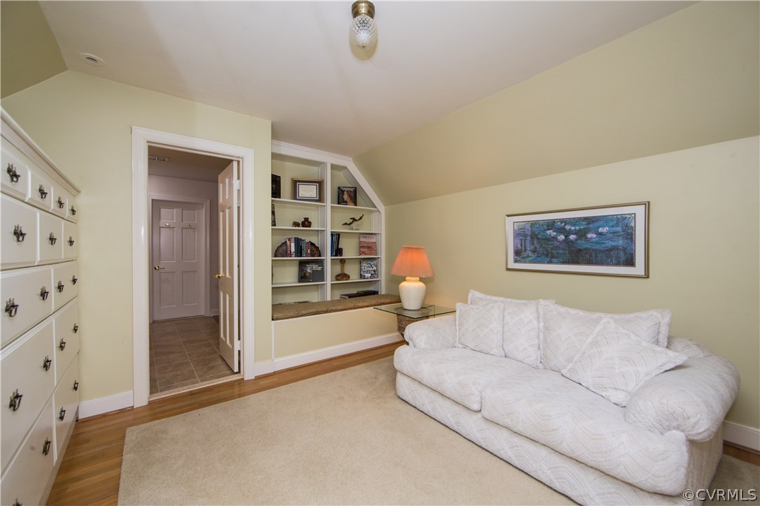 2729 West Brigstock Road Midlothian, VA 23113 - Photo 28 of 50 a living room with furniture and a flat screen tv