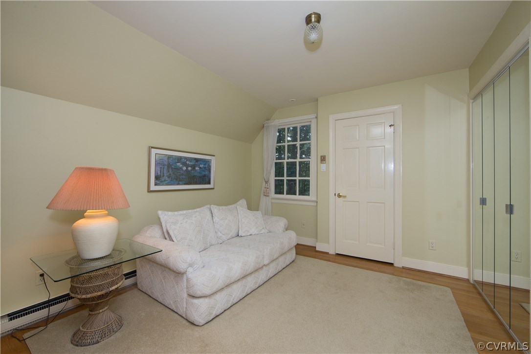 2729 West Brigstock Road Midlothian, VA 23113 - Photo 29 of 50 a living room with furniture and a window