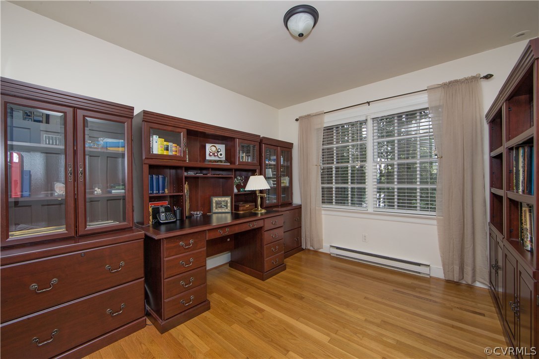 2729 West Brigstock Road Midlothian, VA 23113 - Photo 35 of 50 a room with furniture window and book shelf