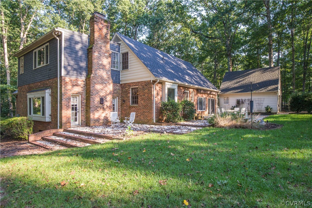 2729 West Brigstock Road Midlothian, VA 23113 - Photo 40 of 50 a view of a house with a yard porch and sitting area