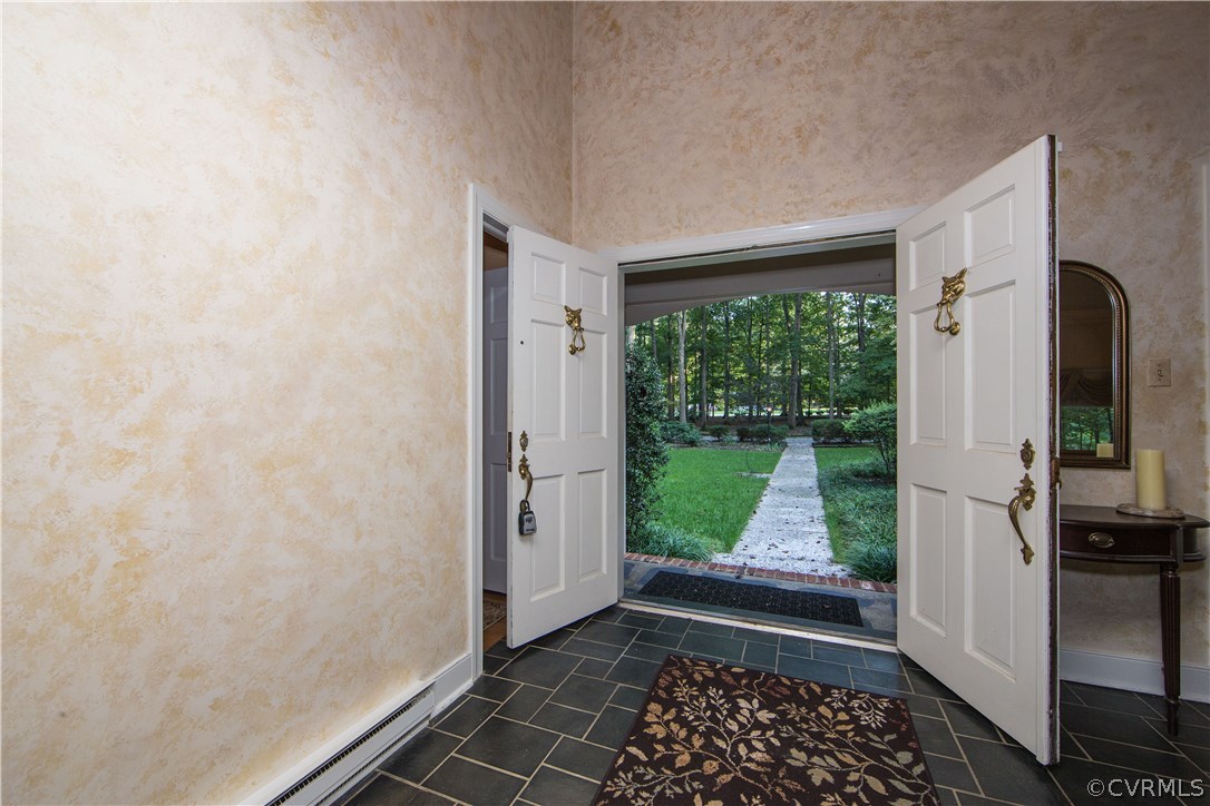 2729 West Brigstock Road Midlothian, VA 23113 - Photo 4 of 50 a view of a room that has a large window