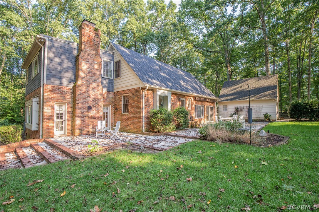 2729 West Brigstock Road Midlothian, VA 23113 - Photo 42 of 50 a view of a house with a yard porch and sitting area