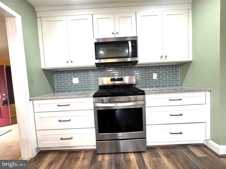 209 Mountain Road Linthicum Heights, MD 21090 - Photo 13 of 59 Modern kitchen with sleek finishes.
