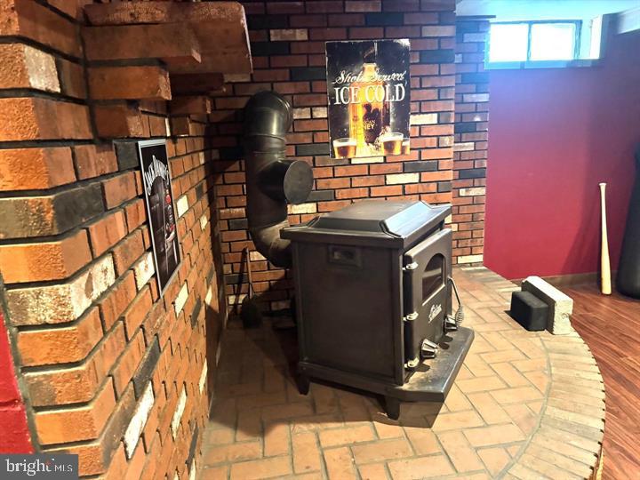 209 Mountain Road Linthicum Heights, MD 21090 - Photo 34 of 59 Cozy brick corner with a vintage stove.