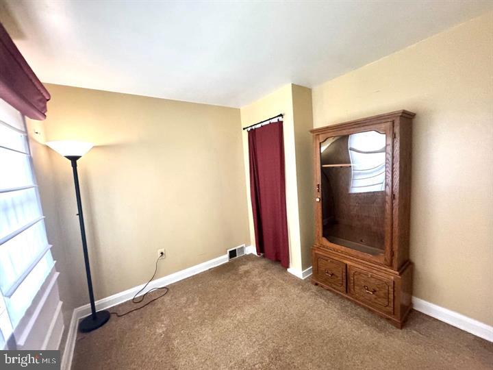 209 Mountain Road Linthicum Heights, MD 21090 - Photo 40 of 59 Cozy room with warm, inviting tones.