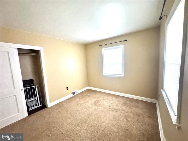 209 Mountain Road Linthicum Heights, MD 21090 - Photo 46 of 59 Bright and inviting empty room.