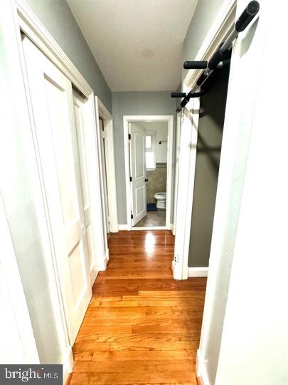 209 Mountain Road Linthicum Heights, MD 21090 - Photo 49 of 59 Inviting hallway with warm wood floors.