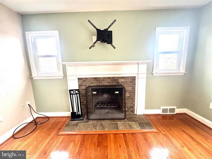 209 Mountain Road Linthicum Heights, MD 21090 - Photo 54 of 59 Cozy living space with a fireplace.