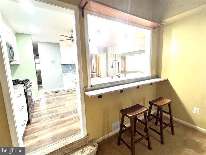209 Mountain Road Linthicum Heights, MD 21090 - Photo 9 of 59 Cozy kitchen pass-through bar area.