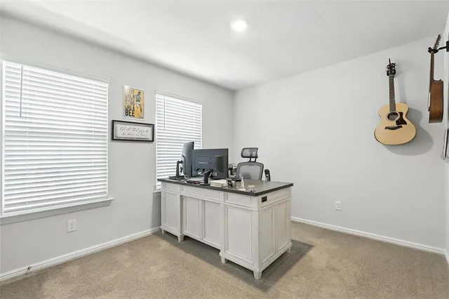 a kitchen with stainless steel appliances granite countertop a sink stove and window