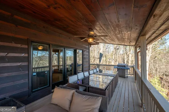 a bed room with a bed and a chair