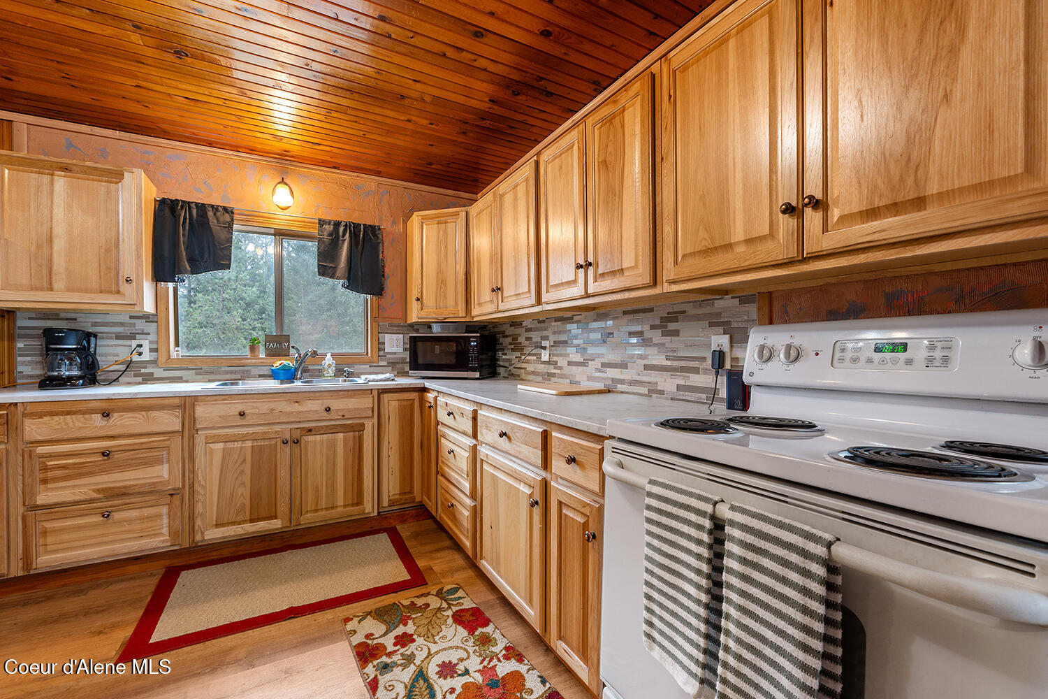 1189 South Allen Road Coeur D'Alene, ID 83814 - Photo 9 of 42 SINK WINDOW VIEW