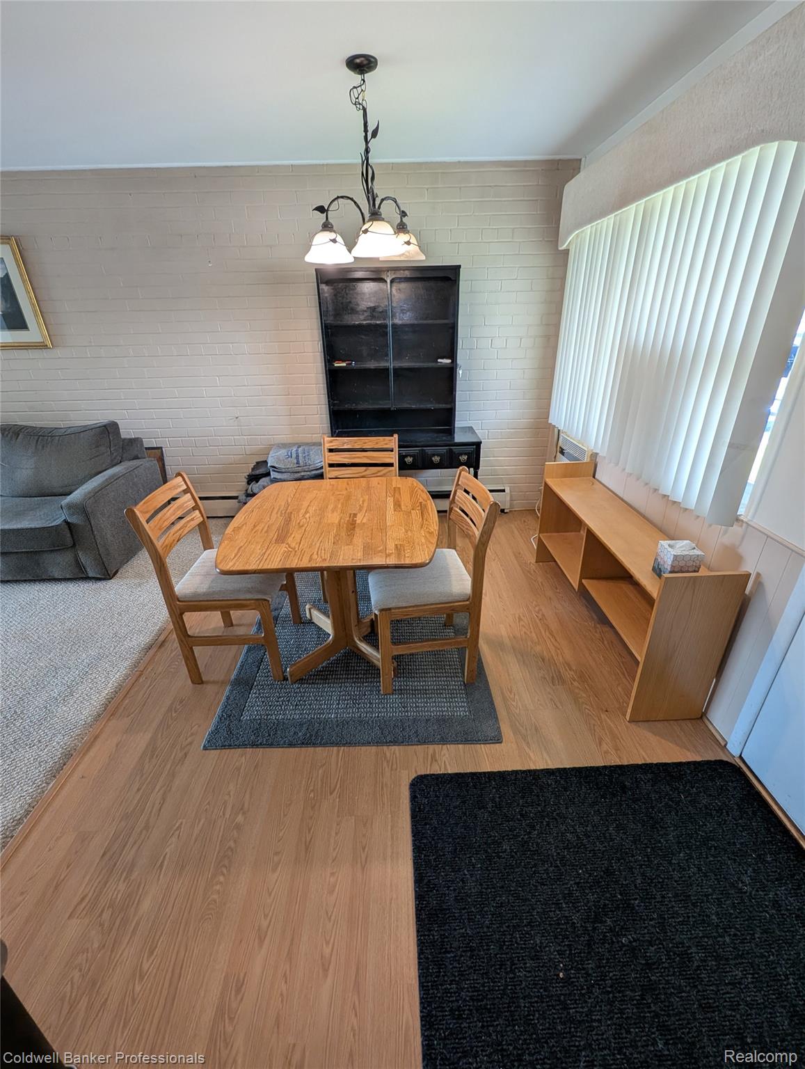 26945 Milford Road, Unit 8 New Hudson, MI 48165 - Photo 9 of 31 Dining room with light wood-style floors