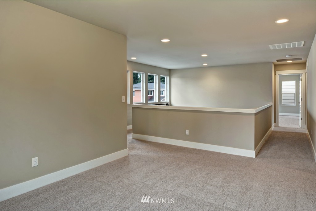3527 178th Street Southeast, Unit 1032 Bothell, WA 98012 - Photo 7 of 15 a view of an empty room with a window