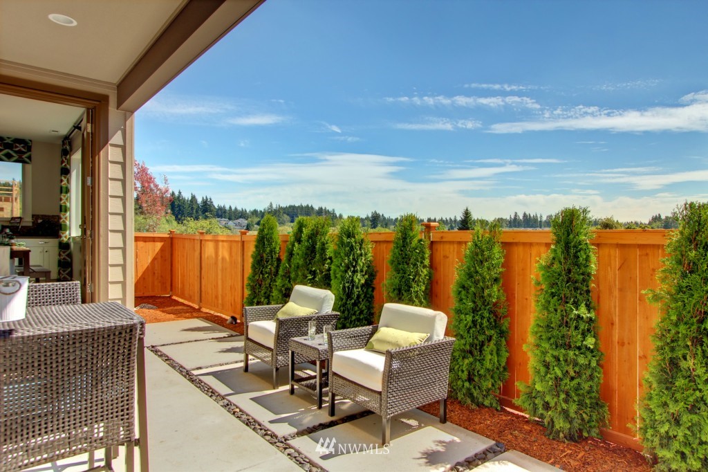 3527 178th Street Southeast, Unit 1032 Bothell, WA 98012 - Photo 8 of 15 a view of sitting area with furniture and wooden fence