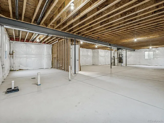 a bathroom with a tub and shower