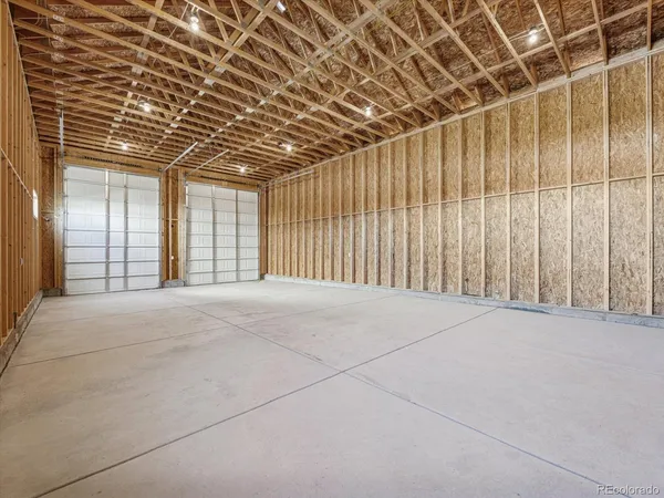 a view of a room with wooden walls