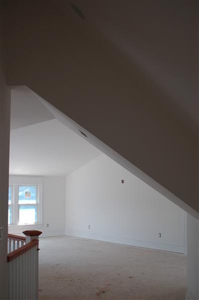 Undisclosed Address Mashpee, MA 02649 - Photo 13 of 18 a view of a livingroom with wooden floor and a window