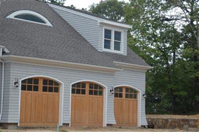Undisclosed Address Mashpee, MA 02649 - Photo 6 of 18 a front view of a house with a yard