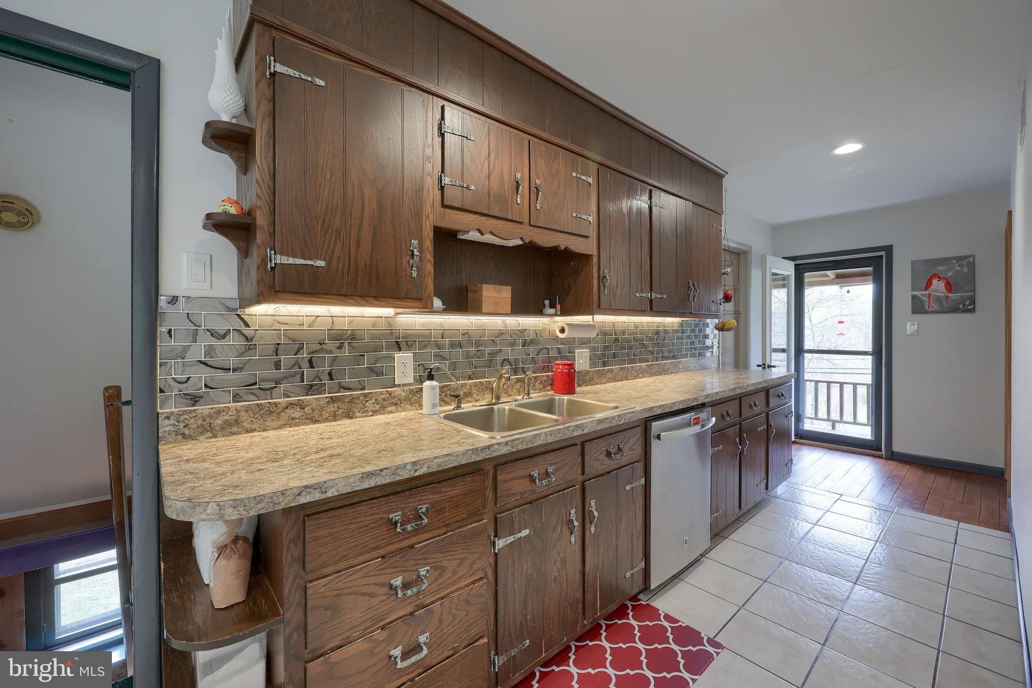 378 Bridge Valley Road Pequea, PA 17565 - Photo 15 of 42 a kitchen with stainless steel appliances granite countertop a sink and cabinets