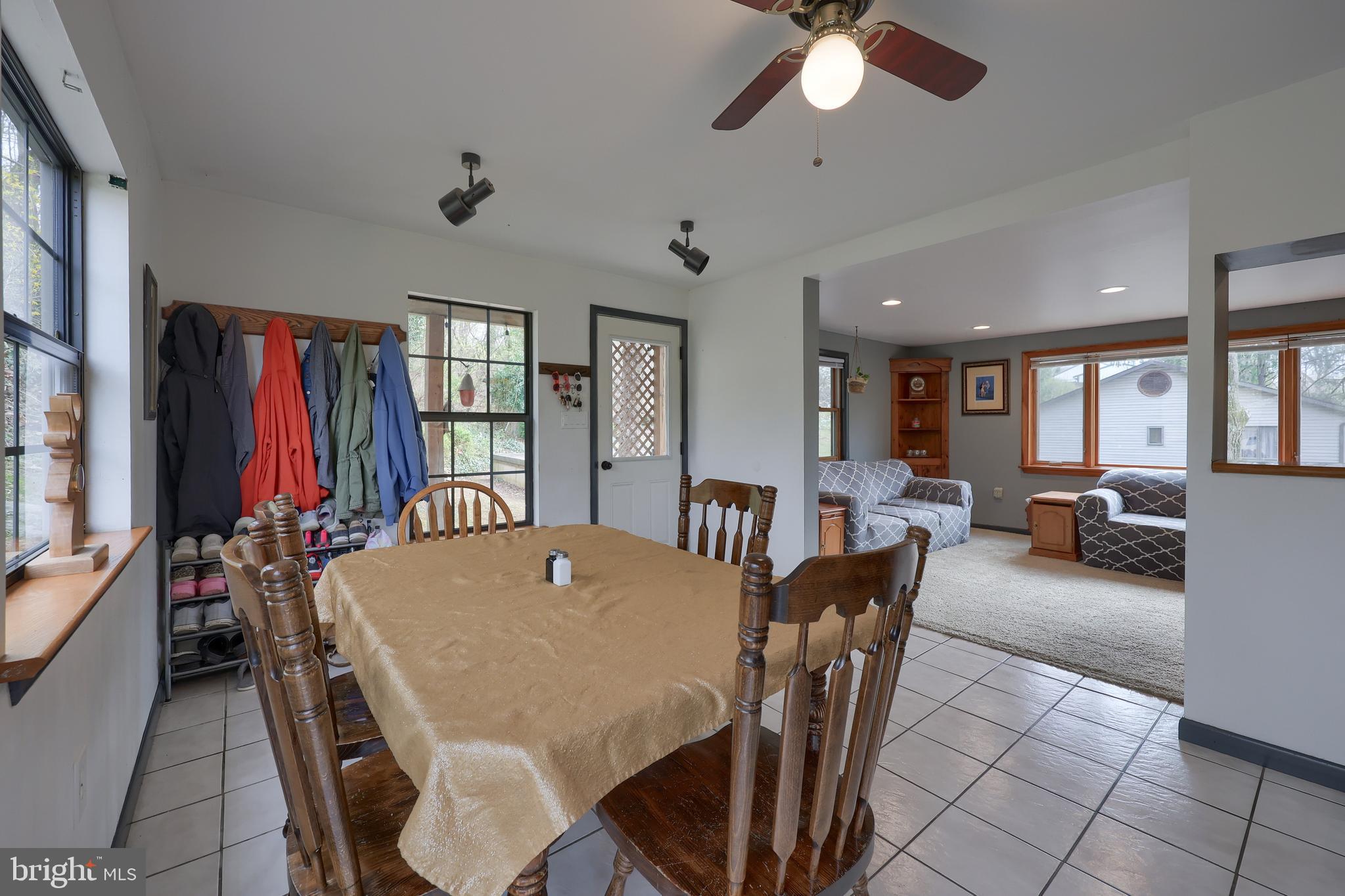 378 Bridge Valley Road Pequea, PA 17565 - Photo 8 of 42 a view of a dining room with furniture and a chandelier