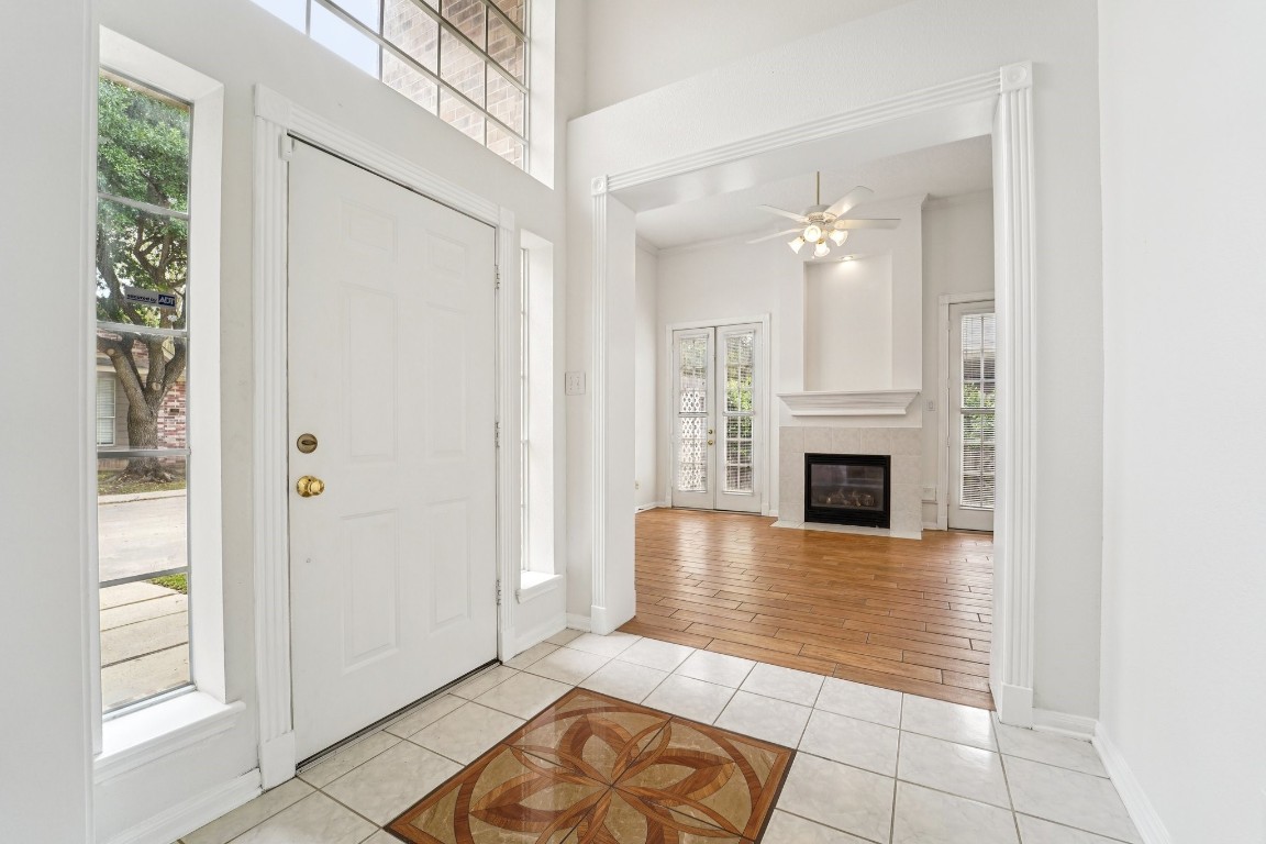 14420 Walters Road, Unit 55 Houston, TX 77014 - Photo 2 of 35 a view of a livingroom with an empty space and a fireplace