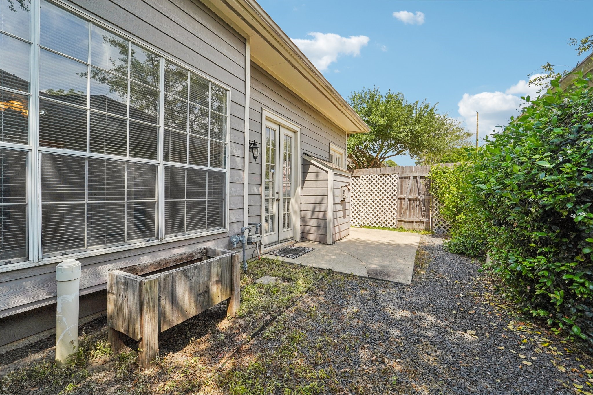 14420 Walters Road, Unit 55 Houston, TX 77014 - Photo 34 of 35 a view of a backyard with a large tree
