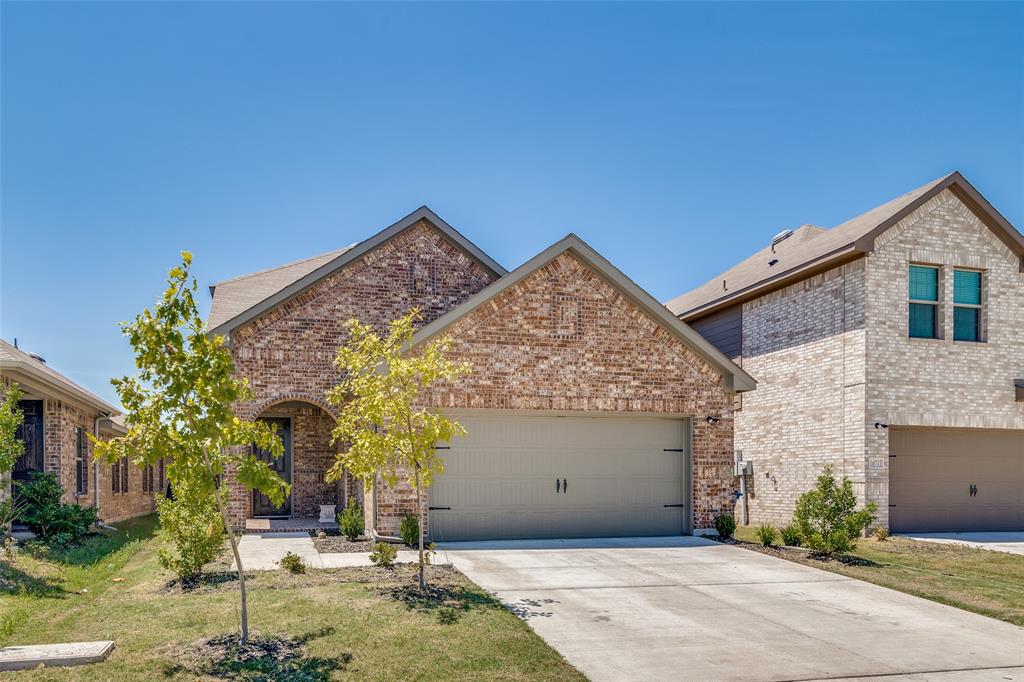 1069 Norias Drive Forney, TX 75126 - Photo 1 of 36 a front view of a house with a yard