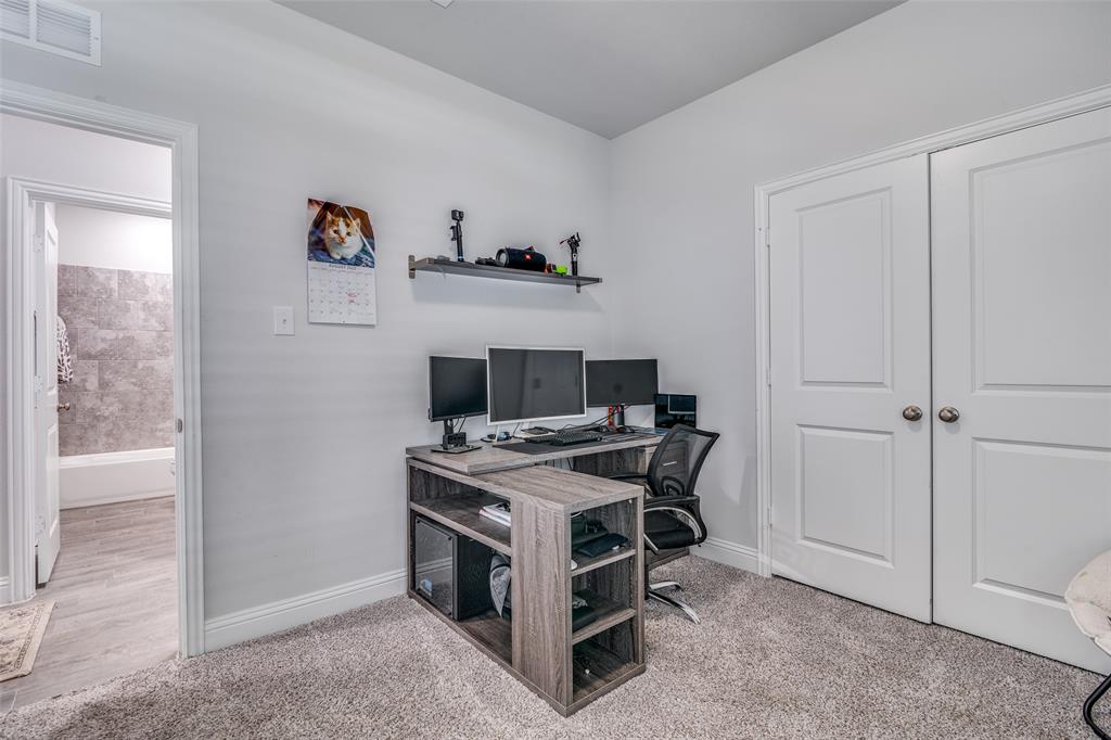 1069 Norias Drive Forney, TX 75126 - Photo 22 of 36 a view of a workspace with furniture